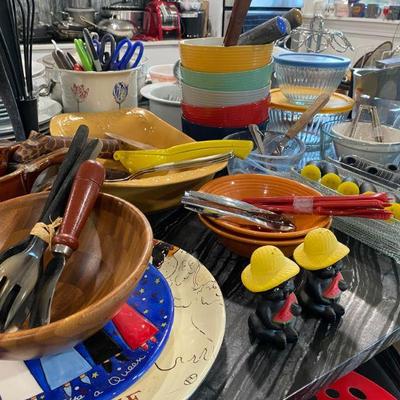 Colorful kitchen gadgets, bowls, salt pepper, corn holders, kitchen scissors