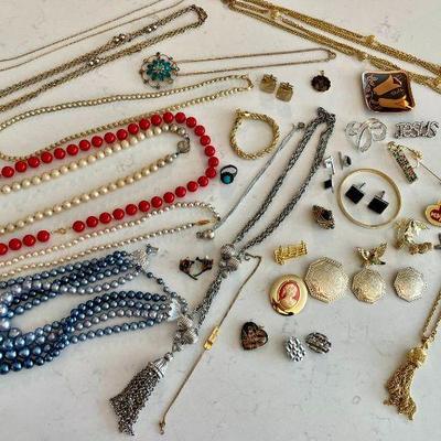 Lot 050-LOC: Costume-Jewelry Grab-Bag

Features: 
â€¢	Includes an assortment of colorful necklaces, pins, brooches, and earrings. All...