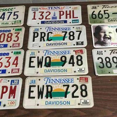Lot 134-G: TN License Plate Assortment

Features: 
â€¢	11 Tennessee plates (10 license plates and one display plate) spanning from...