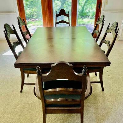 Lot 002-DR: MC Formal Dining Table & Chairs

Features: 
â€¢	Extendable, hefty mid-century formal dining table and 6 chairs
â€¢	Chairs...