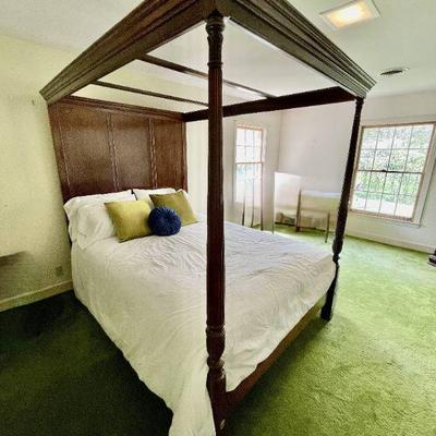 Lot 021-MBD: Queen Canopy Bed

Features: 
â€¢	Large canopy bed with a massive 80â€ high and 62â€ wide headboard
â€¢	Design includes...