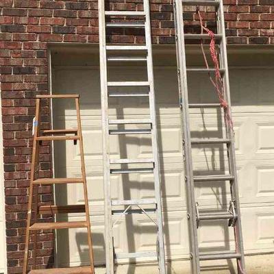 Lot 133-G: We Ladders Three

Includes: 
â€¢	Two 20â€™ aluminum extension ladders and one 6â€™ wooden stepladder
â€¢	One of the extension...
