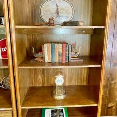 Lot 018- BON: Bookshelf Vignette #3

Features: 
â€¢	Vintage bookcase with brass corner detailing and 4 shelves
â€¢	Metal box, vintage...