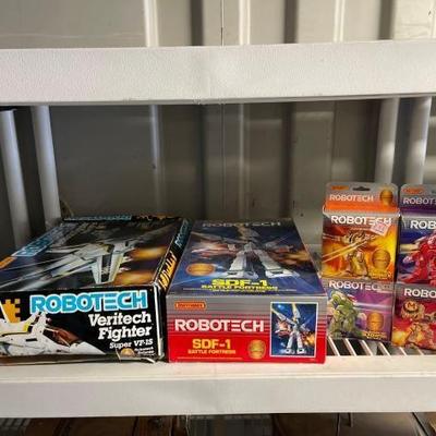 #7576 â€¢ Robotech Figurines and Empty Boxes
