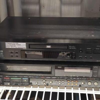 #7718 â€¢ Onkyo DVD player & Minolta Hi-Fi 4+2 Head VHS Player
