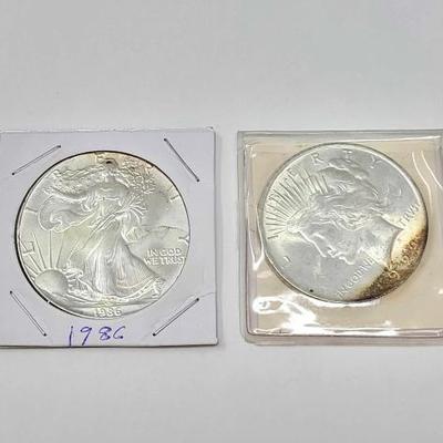 #1300 â€¢ (2) 1986 American Silver Eagle Dollar & 1922 Liberty Silver Peace Dollar
