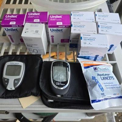 #10578 â€¢ (2) Blood Glucose Meters, (2) Cases, and Lancets
