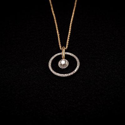 14K Gold Necklace with Circle Pendent and Round Cut Diamond
