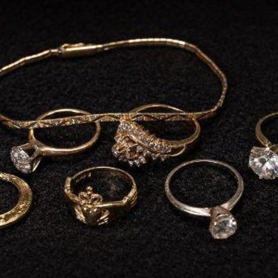 14 Karat Yellow Gold Ear Rings, Bracelet, and Rings
