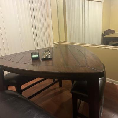 Triangle unique dark wood table with 3 bench chairs 