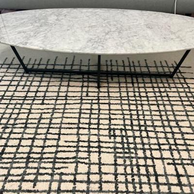 Room and Board Soto marble coffee table features subtle mid-century influences, with a hand-welded natural steel base.
