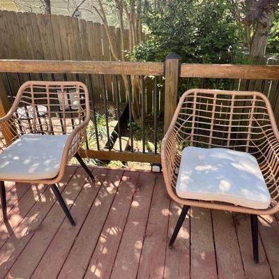 4 wicker styled outdoor chairs