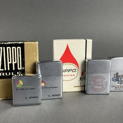 Lot 411 | Vintage Zippo Lighters & Rule