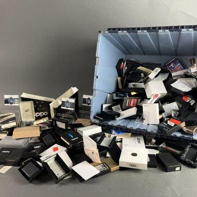 Lot 601 | Large Lot of Empty Zippo Boxes & Displays