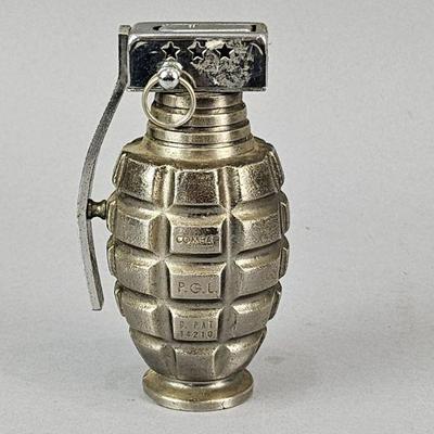 Lot 560 | Vtg Combat P.G.L. Hand GrenadeTable Lighter