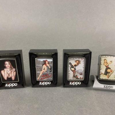 Lot 482 | Zippo Pin Up Girl Lighters & More