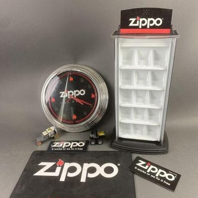 Lot 330 | Zippo Display Case, Clock & More