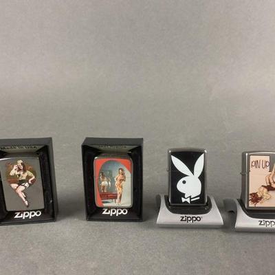 Lot 479 | Pin Up Girl Zippo Lighters & More