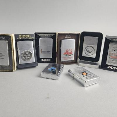 Lot 574 | Zippo Advertising Lighters & More!