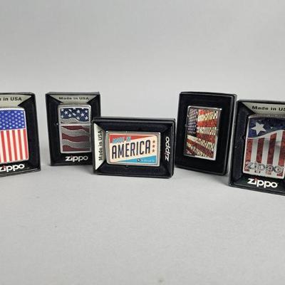 Lot 420 | Zippo American Flag Lighters & More!
