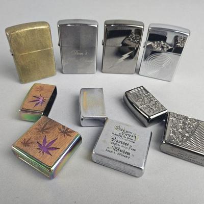 Lot 582 | Zippo Lighters & Cases