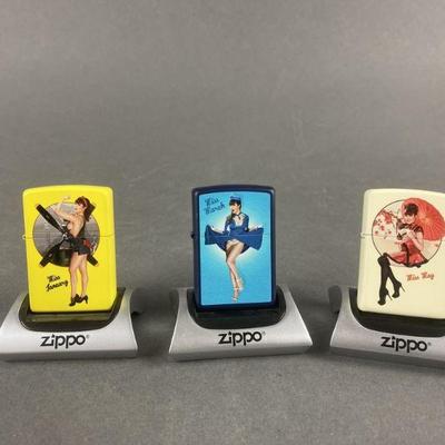Lot 473 | 3 Pin Up Girls Zippo Lighters