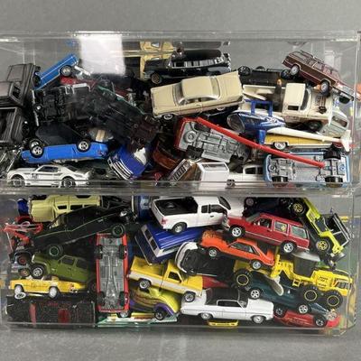 Lot 141 | Clear Display Bins Full of Die Cast Cars