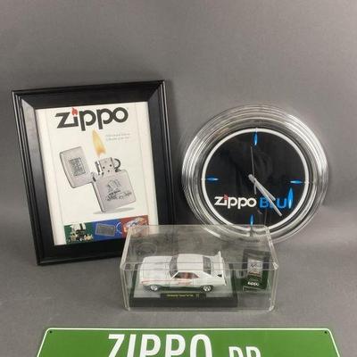 Lot 211 | Zippo Blu Clock & More