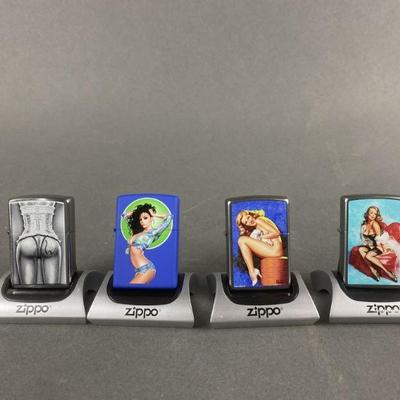 Lot 477 | 4 Zippo Pin Up Girl Lighters With Magnetic Stands