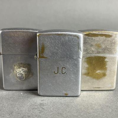 Lot 422 | 3 Early Zippo Lighters