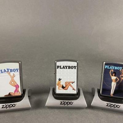 Lot 466 | 3 Zippo Playboy Lighters With Magnetic Stands