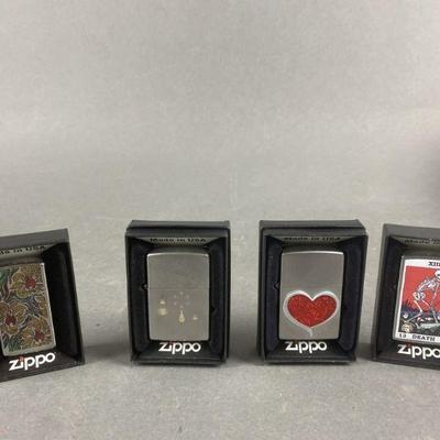 Lot 391 | Floral Fusion Zippo Lighter & More