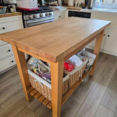 Very solid butcher block table.  $250
