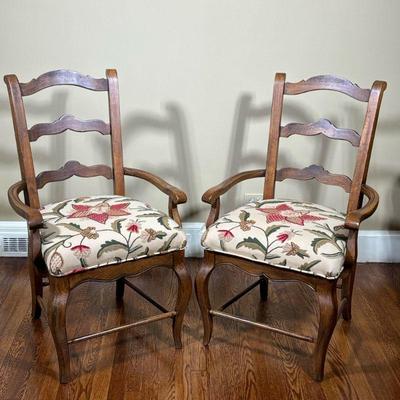 PAIR SPANISH STYLE LADDER BACK ARMCHAIRS | With crewel work seats. - l. 23 x w. 24 x h. 39 in

