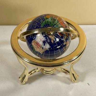 SPECIMEN STONE ARMILLARY | Blue globe with wire inlay mounted in polished brass, featuring a compass. - h. 8 in

