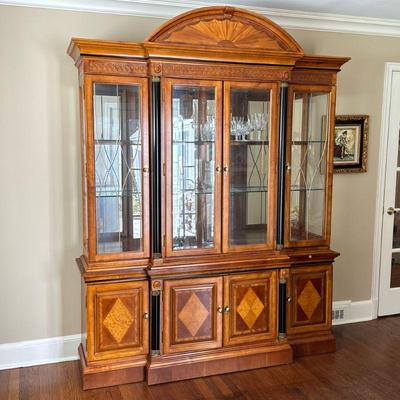 CUSTOM CONTEMPORARY BREAKFRONT CABINET | Dome top over beveled glass doors. Brass hardware. 4 inlaid wood doors on the bottom half for...