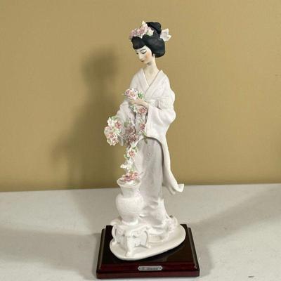 GIUSEPPE ARMANI PORCELAIN FIGURE | Geisha with flowers marked 1987 Florence. - h. 12.5 in


