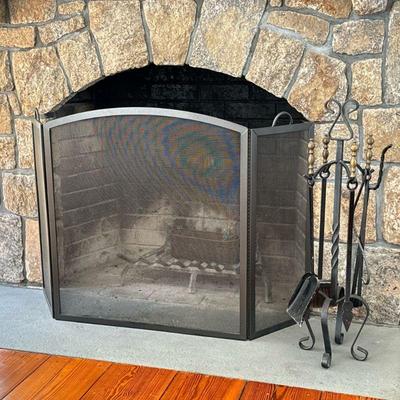 (6PC) FIREPLACE EQUIPMENT SET | Including iron screen with four brass handle, wrought iron tools on a stand. - l. 54 x h. 33 in (Screen)

