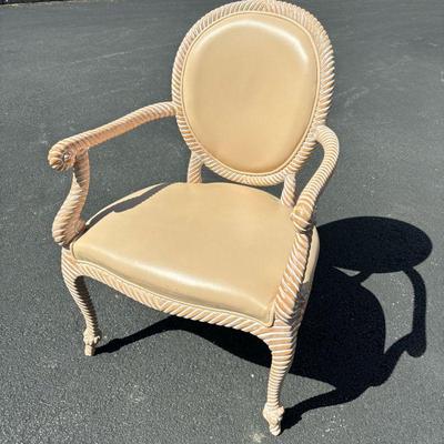 LIGHT PINK CARVED PATTERN ARMCHAIR | Leather seat with spiral motif carved wood legs and frame. - l. 25 x w. 24 x h. 37 in

