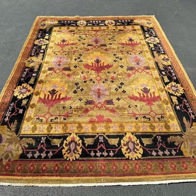 TUFENKIAN TIBETAN HAND LOOMED CARPET | Black gold and pale green with geometric devices; oriental hand-knotted wool rug. - l. 142 x w....