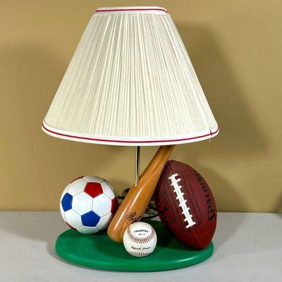 CHILD’S SPORTS TABLETOP LAMP | Sports lamp. - l. 15 x w. 8 x h. 17 in

