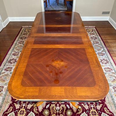 CUSTOM CONTEMPORARY DOUBLE PEDESTAL DINING TABLE | Inlaid decorative top. 2 leaves, each 15 inches. - l. 72 x w. 44 x h. 30 in

