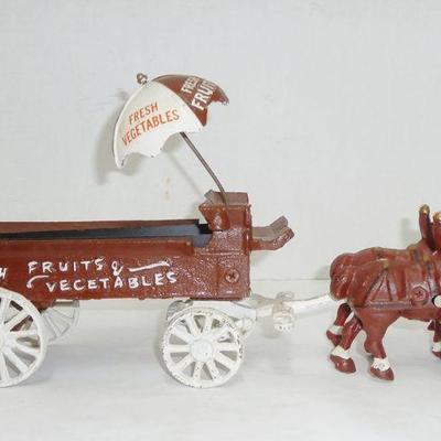 several cast iron repro toys