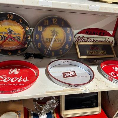 Beer advertising clocks, signs and trays
