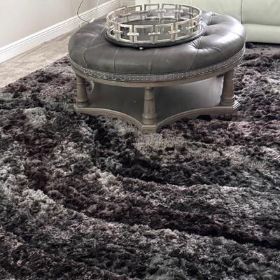 Large gray shag rug