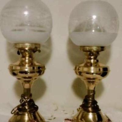Vintage table lamps in polished brass/glass globes