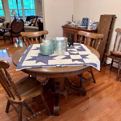 Dining Table has two leaves and eight chairs