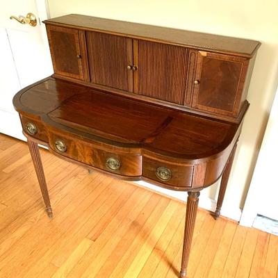 Mahogany writing desk with tambour top