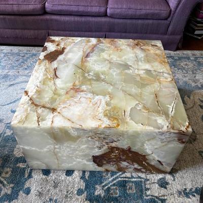 Mcm tan marble coffee table block on wheels 