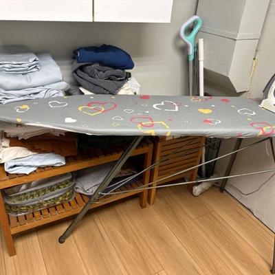 Ironing board, shelving racks & cleaning supplies